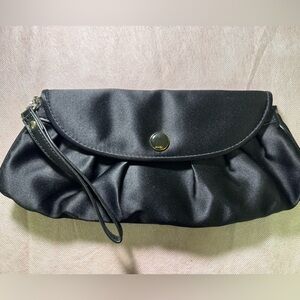 NY&C clutch (wristlet) with handle in excellent condition has inside zipper
